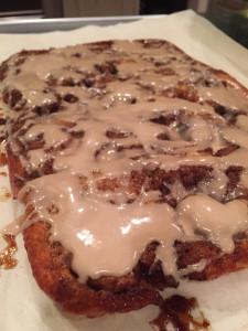 pan of cinnamon rolls with frosting